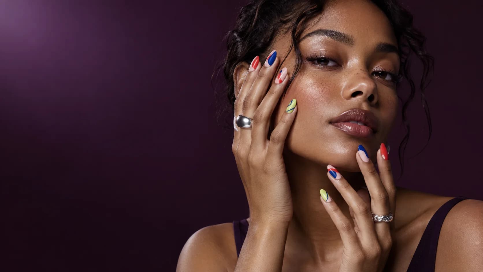 SET THEORY nail studio concept hero with colourful graphic nails